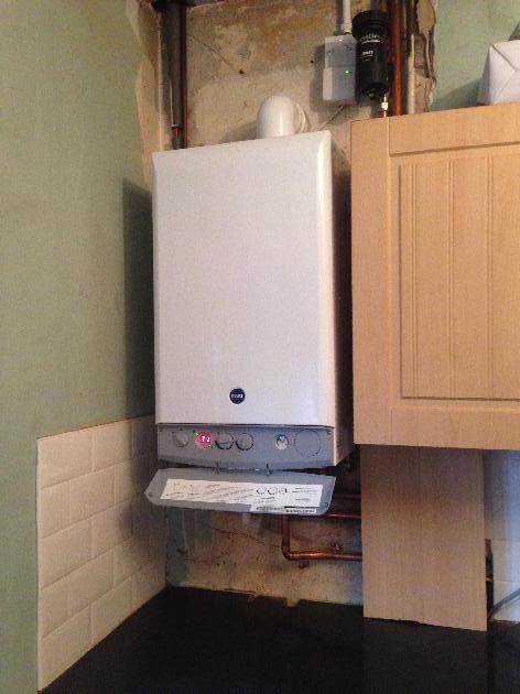 Anything would be an improvement on this mess but a shiny new Baxi Duotec with 7 year warranty will do nicely.