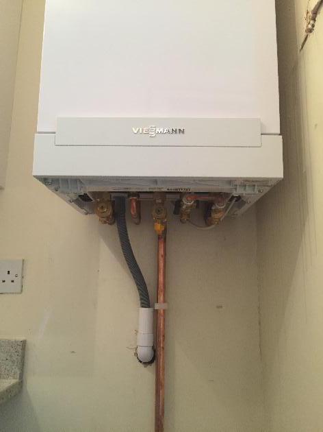Viessmann Vitodens 100 combi boiler fitted before a new kitchen was fitted around it.
