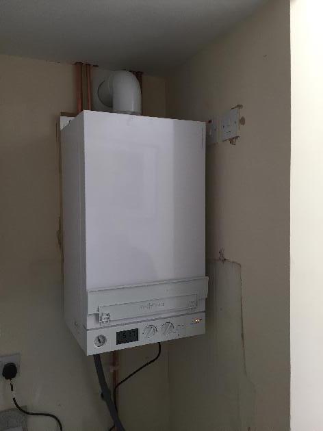 Viessmann Vitodens 100 combi boiler fitted before a new kitchen was fitted around it.